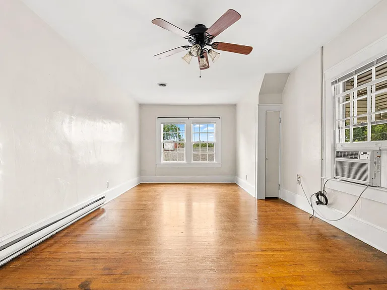 Large front bedroom / living room or bonus space. See floor plan for measurements.