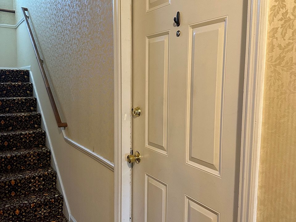 entryway, stairs to central laundry