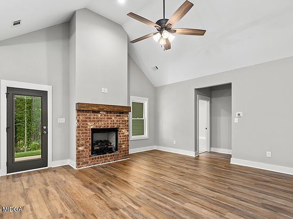 3rd image of 627 Whispering Pines Dr