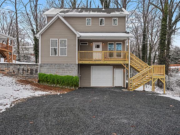 931 E Front was just completed in 2026! Be the first to live in this fantastic home. *Foundation bushes example of what will be added. Fence was added after some of the pictures.*
