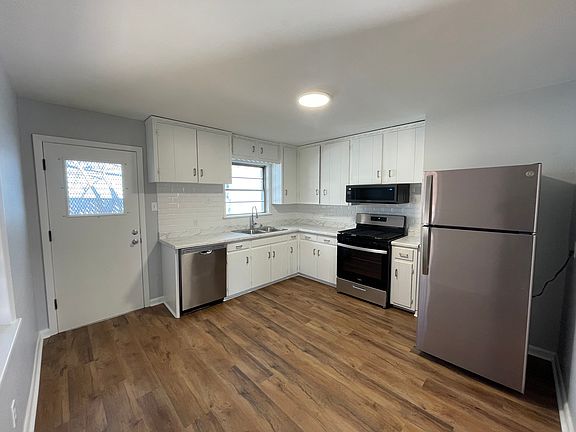 Updated kitchen with all brand-new stainless steel appliances.