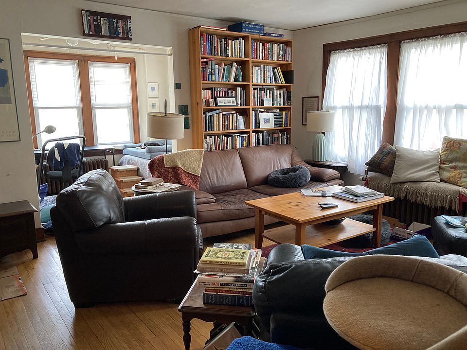 Living room facing looking into sunroom