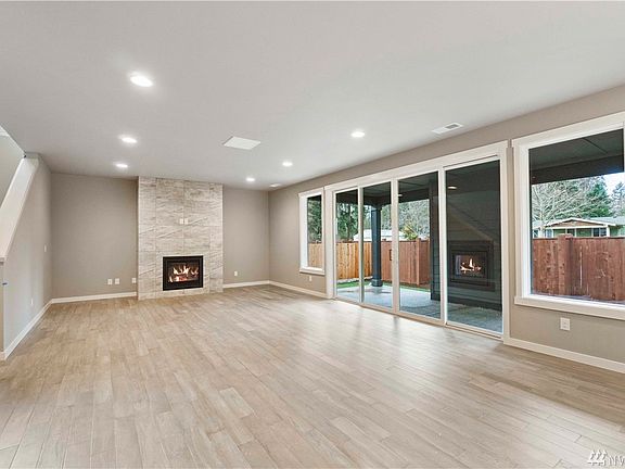 Photos represent same plan in development. Large open living area!