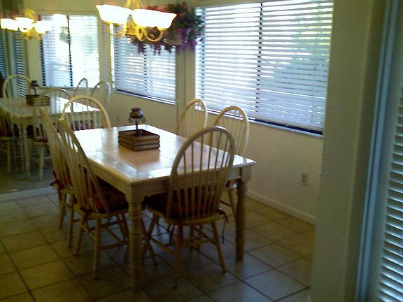 Dining Room w/ Window to Balcony