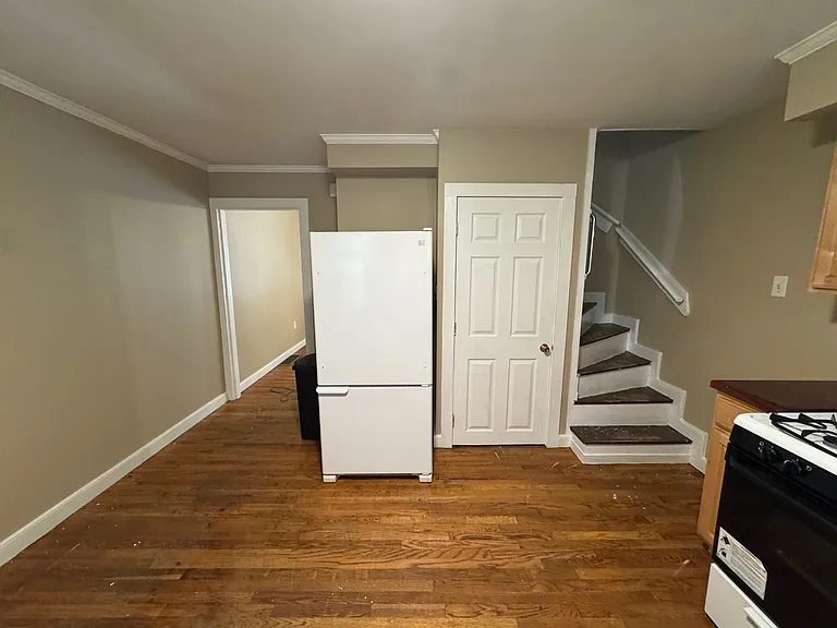 Kitchen looking at basement door