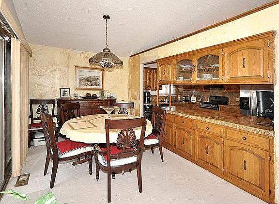 4th image of 8288 Queen Ave N