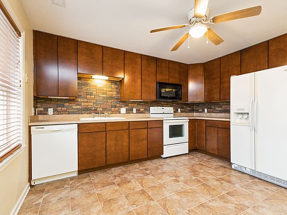 Spacious Updated Eat-In Kitchen with Built-in Microwave, Dishwasher, Stove, Refrigerator