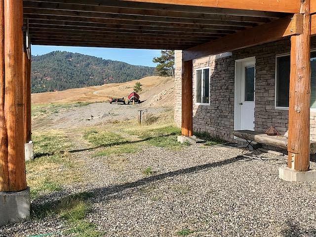 Covered entrance and parking with ground floor private entrance.