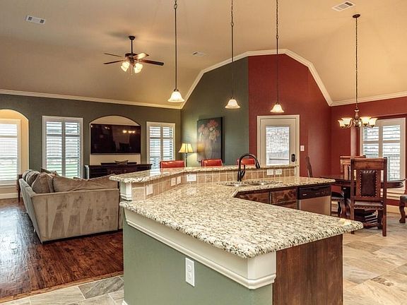 The wide open floor plan keeps the conversation going and guests always seem to gather in the kitchen.