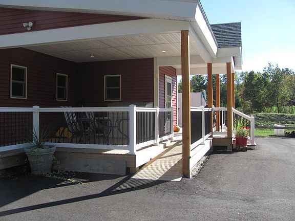 The access ramp under the covered rear porch