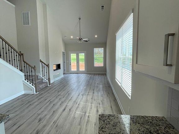 Living room with elevated ceiling