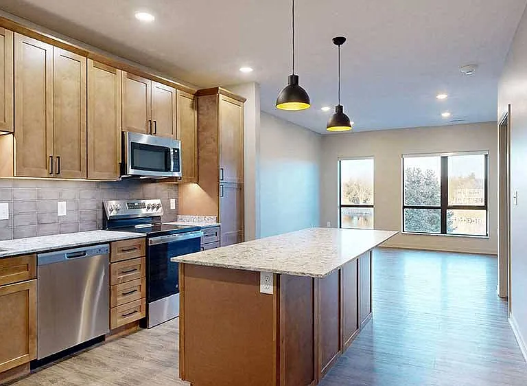 Host in style with a spacious kitchen island and open-concept layout perfect for entertaining.