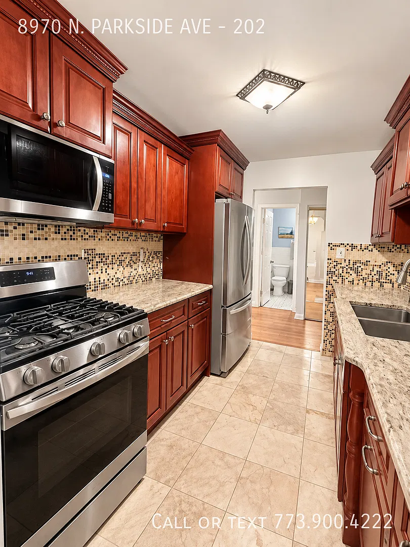 Spacious & Bright 2 Bed, 2 Bath Condo with Private Balcony Heat & More Included! — Photo 2