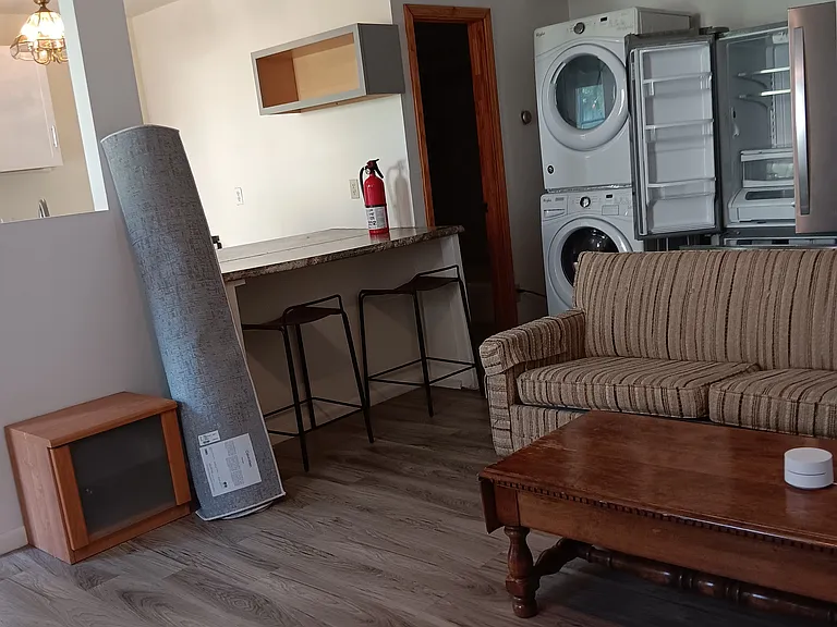 Living room facing kitchen