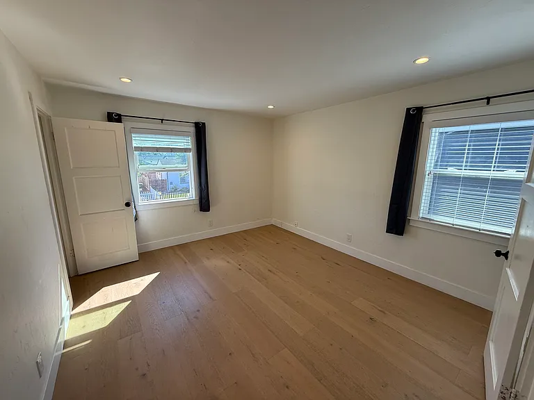 Large bedroom with two closets