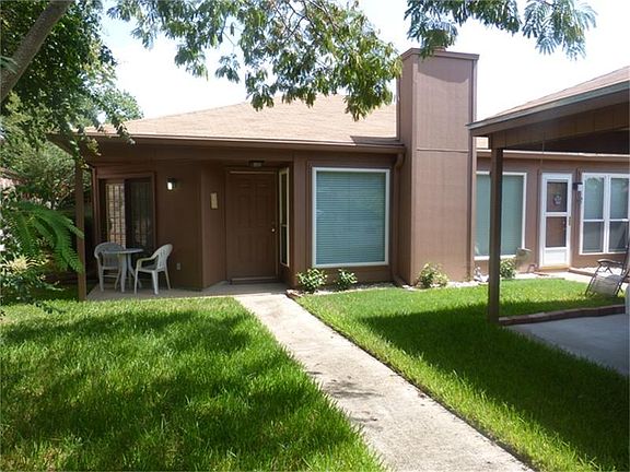 Sit out and enjoy a soothing cup of coffee on this lovely front porch. You'll have direct access from the master bedroom!