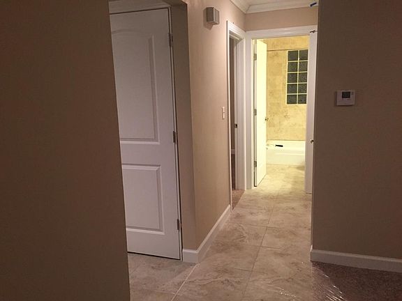 Porcelain tile in kitchen, bath, hallway