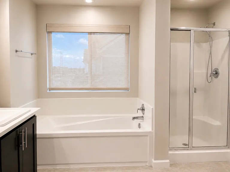 Access the Walk-In Closet from the Bathroom.