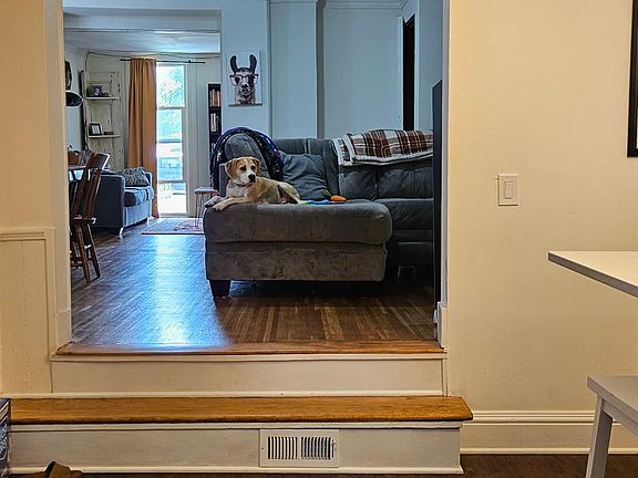 View of the dining room and living room from the kitchen