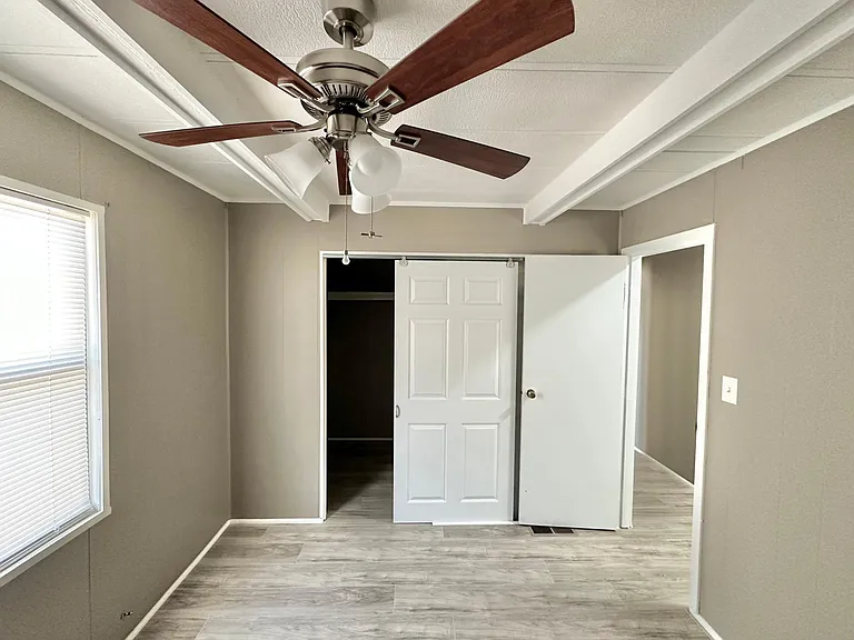 2nd Bedroom (beamed ceilings and ceiling fan)