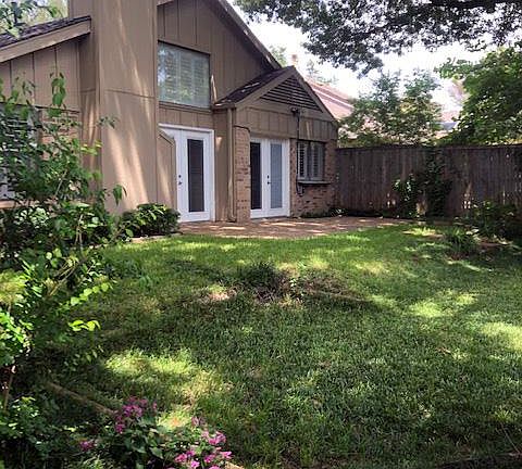 French doors in kitchen and great room open to patio and lawn area.