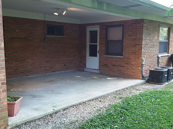 Rear covered patio is 12' X 18'. Access through one of the b