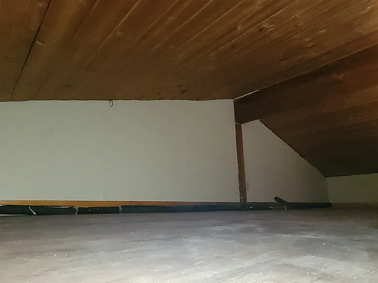 Loft storage on top of the kitchen area