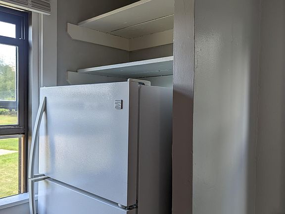 refrigerator with storage above