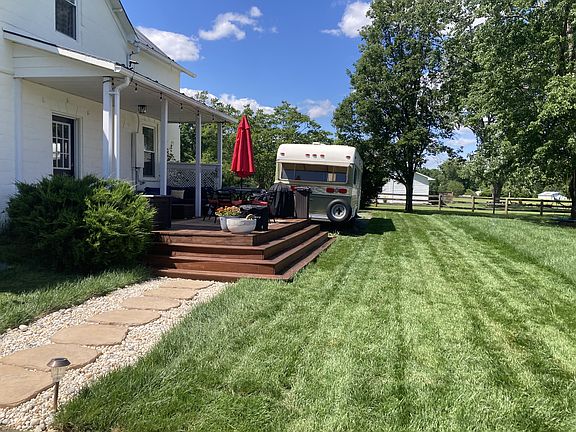 Back of house + deck (camper is no longer there)