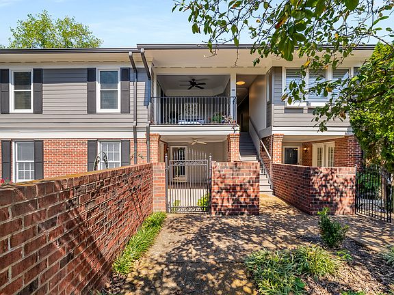 Lower level unit. Accessed through iron gate.