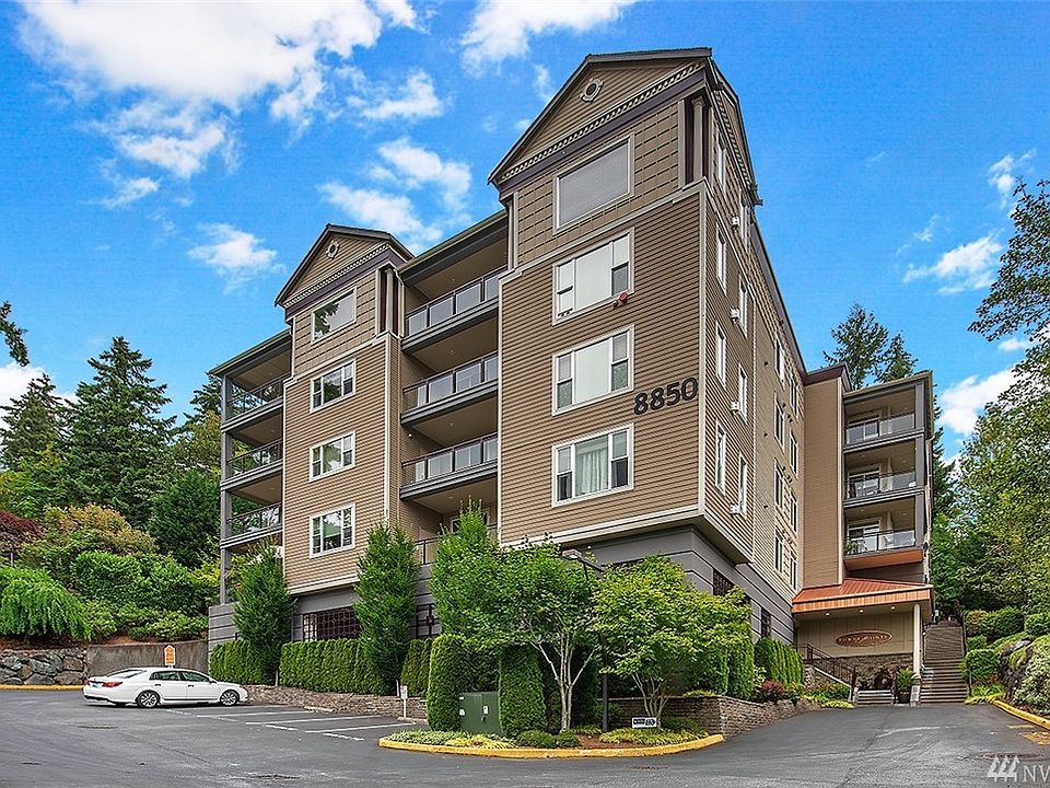 Towne Pointe is perched behind and above another complex and is tucked away. Exterior parking space is 2nd from right. Guest parking spaces are in the other spaces marked as "Reserved". 