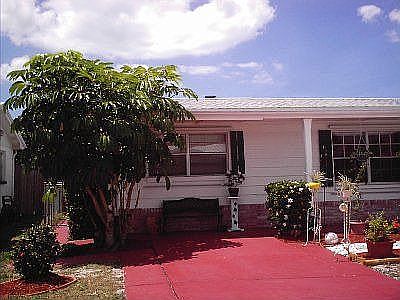 Front of house far left