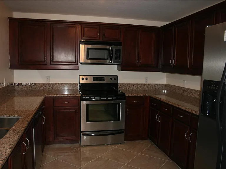 5271 SW 8th St #216 — Photo 2