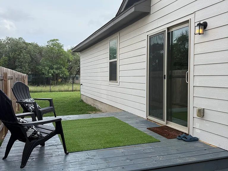 NEW deck off family room with side yard that leads to large back yard! No neighbor directly behind!