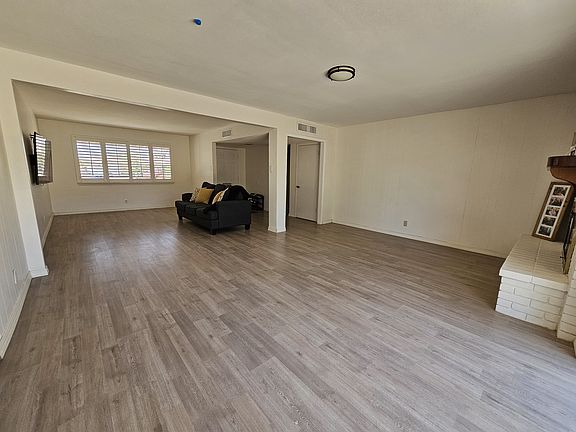 Open living area with large, open plan layout.