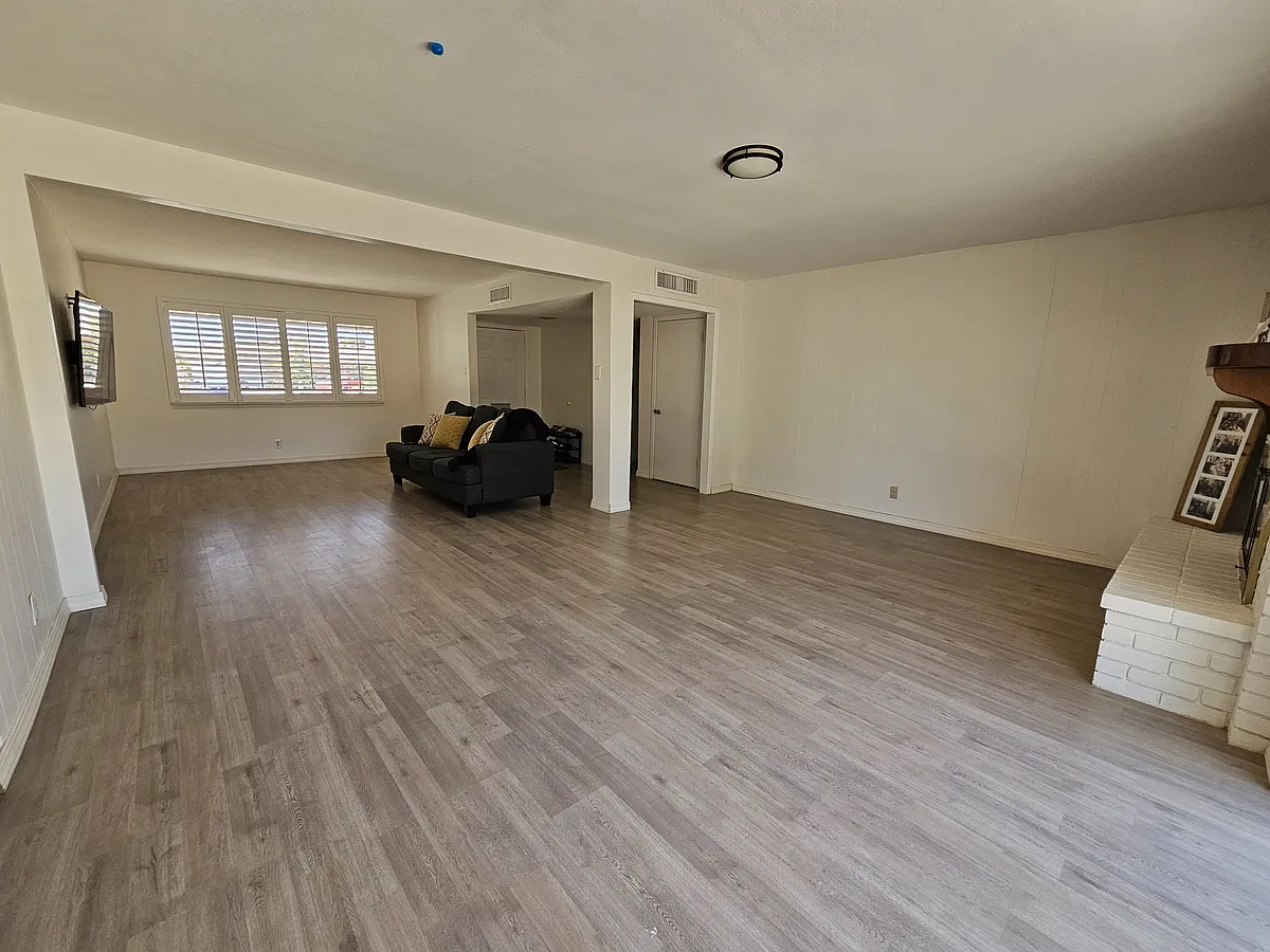Open living area with large, open plan layout. - 244 Carnival Dr