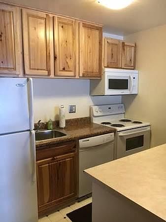 Full kitchen with plenty of cabinets