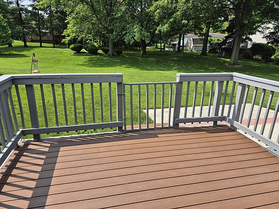 newer back deck with gorgeous back yard that is huge