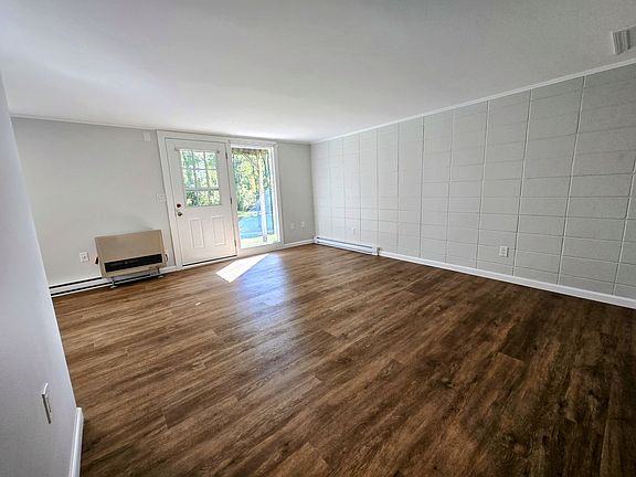 Bright living room with brand-new flooring!