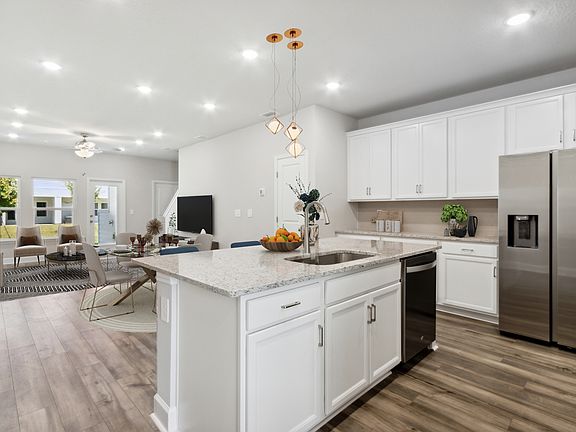 View of living, dining area from kitchen