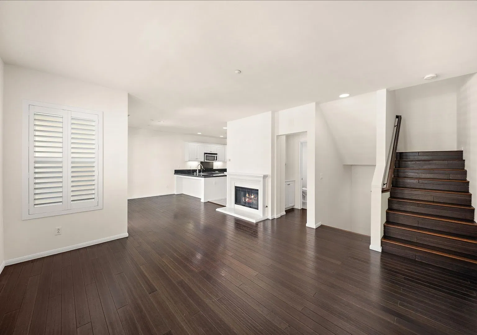 1,330-square-foot townhome offers 2 bedrooms, 2.5 bathrooms, and a 2-car direct-access garage — Photo 2