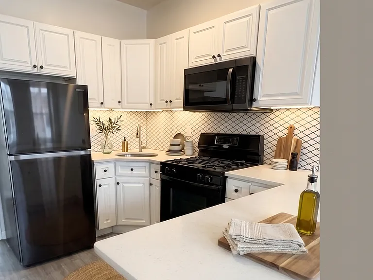 Kitchen- This room has been virtually staged using AI to help visualize its layout and design potential.