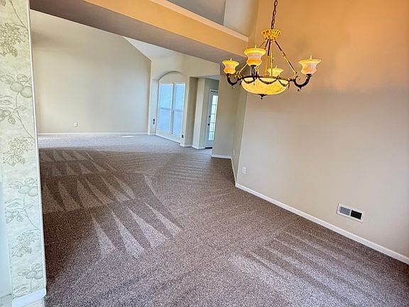Dining area, large Living room with vaulted ceilings