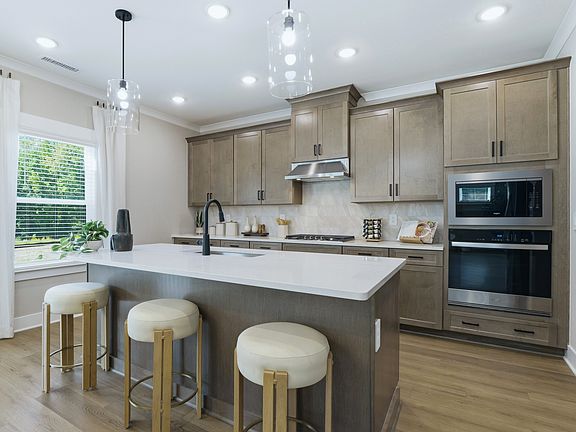 Kitchen in the Taylorsville floorplan at a Meritage Homes community in Zebulon, NC.