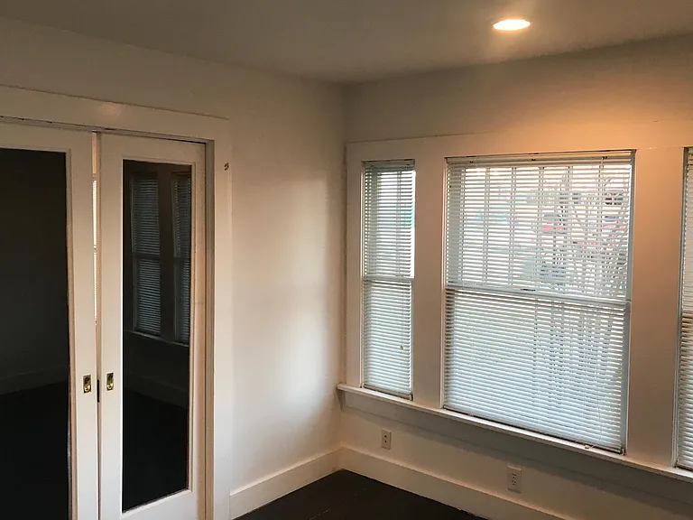 Study from outside corner toward front and living room