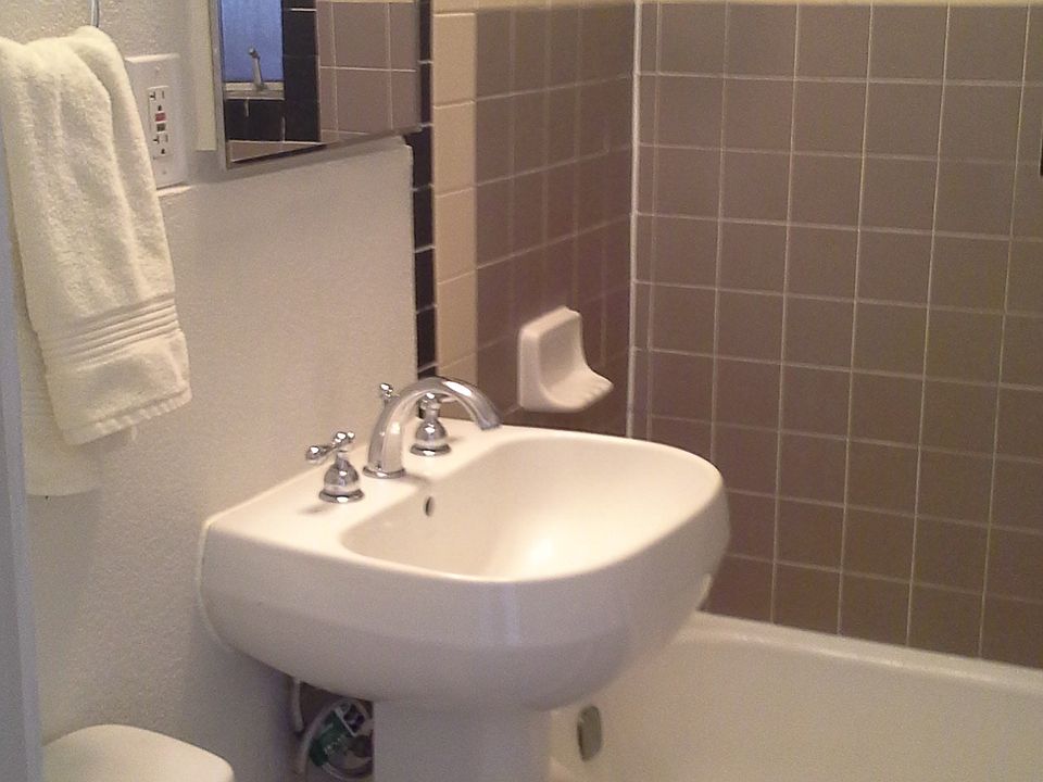 bathroom with large tub