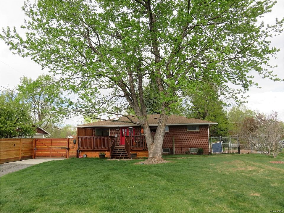 Mature maple tree gives deck plenty of shade.
