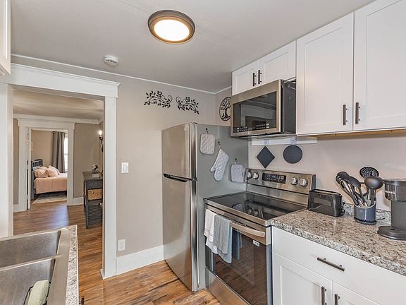 Fully equipped kitchen with modern full size appliances and all essentials included.