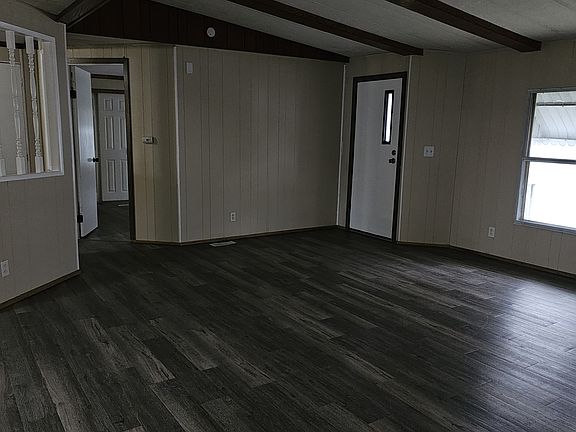 Living room area. Photo taken from hallway in front of hall bath.