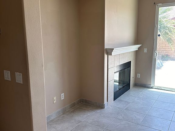 fireplace in great room off of kitchen. open concept